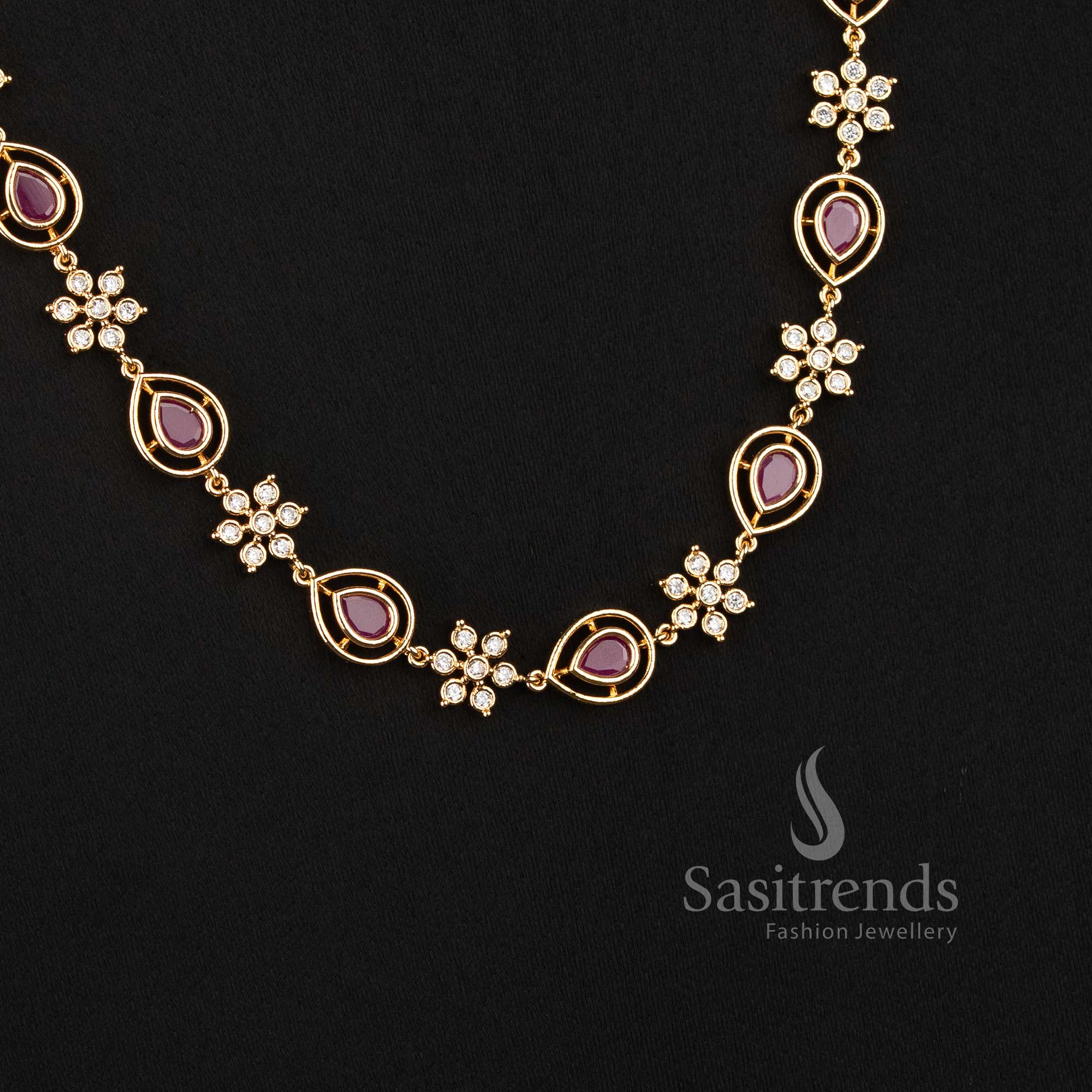 Sasitrends Impon Addigai necklace jewellery featuring delicate floral motifs connected by detailed links with distinctive pear-shaped stone settings 
