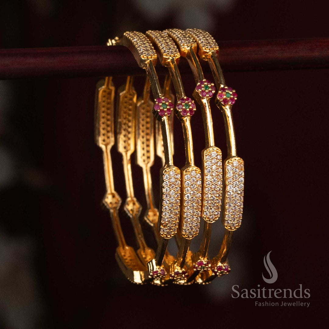 
Sasitrends Micro Gold Plated American Diamond stone designer bangle collection with elongated rectangular pavé panels and delicate floral stone accents
