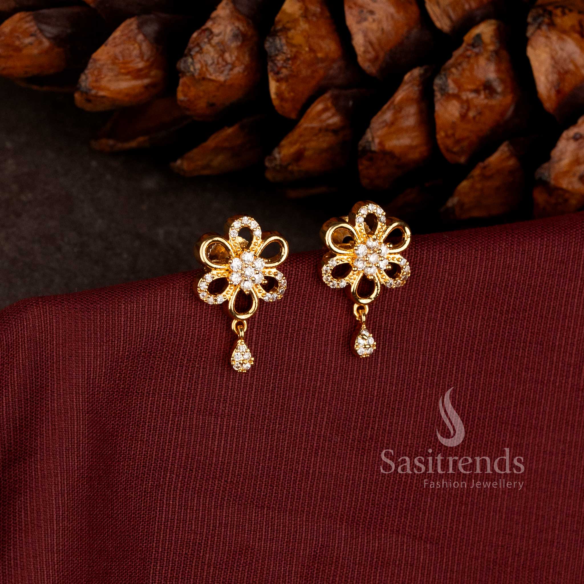 Sasitrends Micro Gold Plated American Diamond floral drop earrings with multi-petal loop structure and teardrop stone dangles for festive wear
