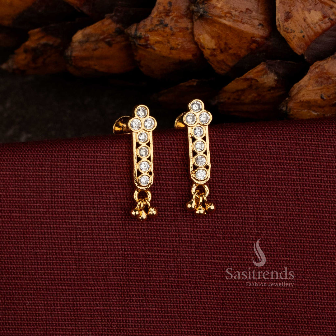 Sasitrends designer American Diamond drop earrings with sparkling round stone settings and delicate dangling golden accents for special occasions