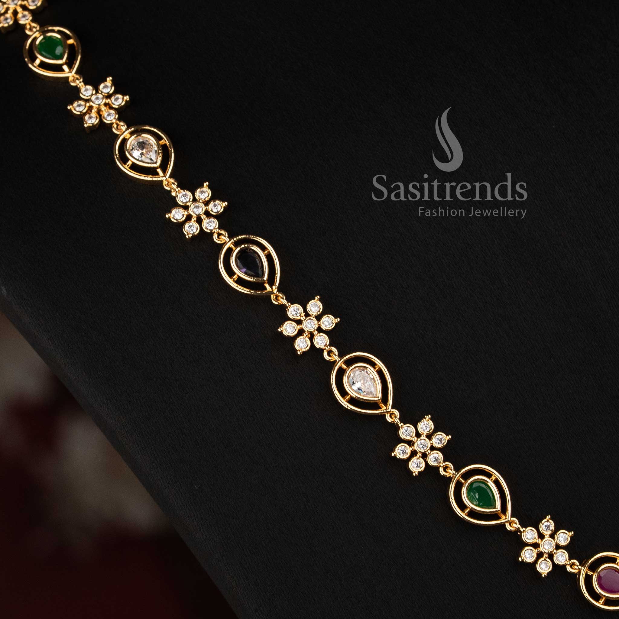 Sasitrends micro gold plated fashionable necklace set with floral AD stone clusters, rounded settings and matching decorative earrings 