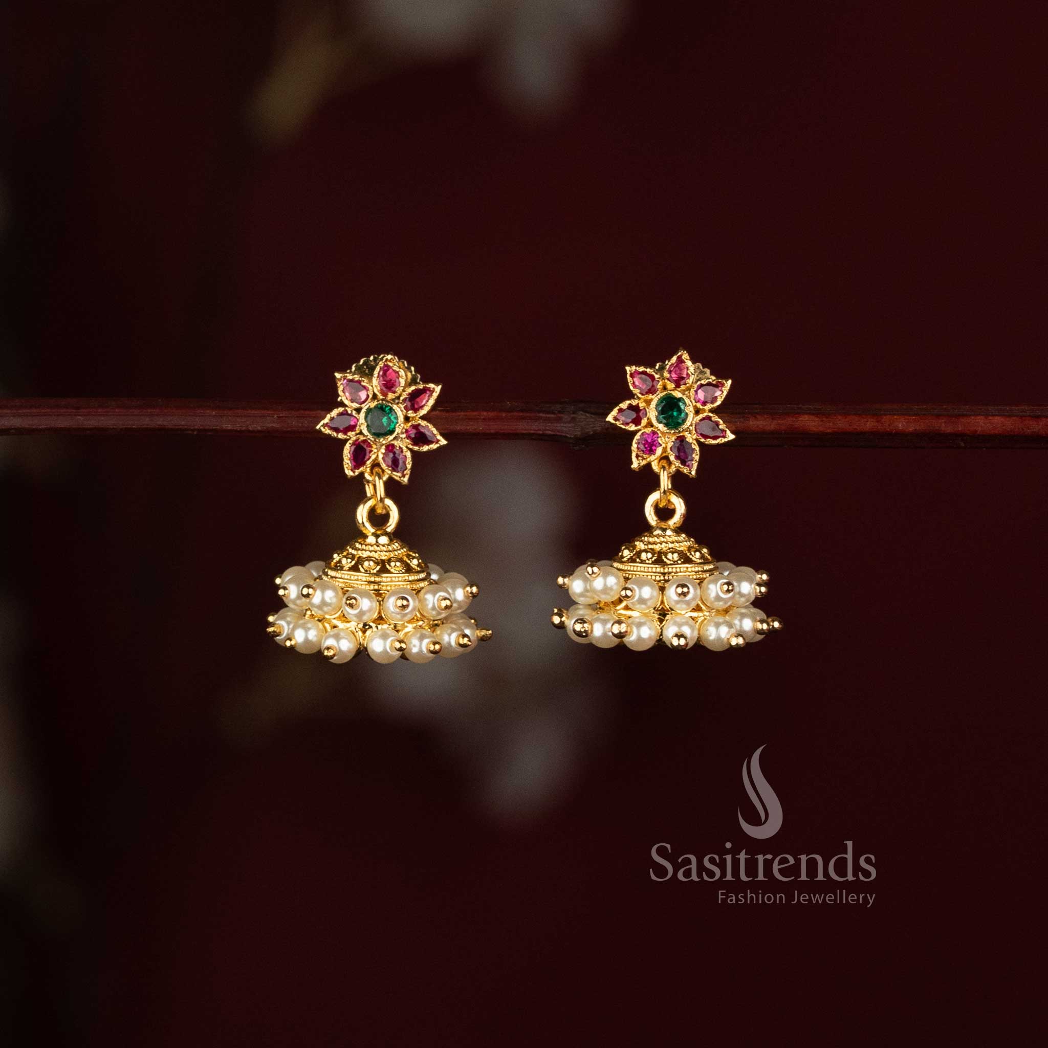 Sasitrends floral jhumka earrings featuring American Diamond stone detailing, pearl fringe and Micro Gold Plated finish for wedding occasions 