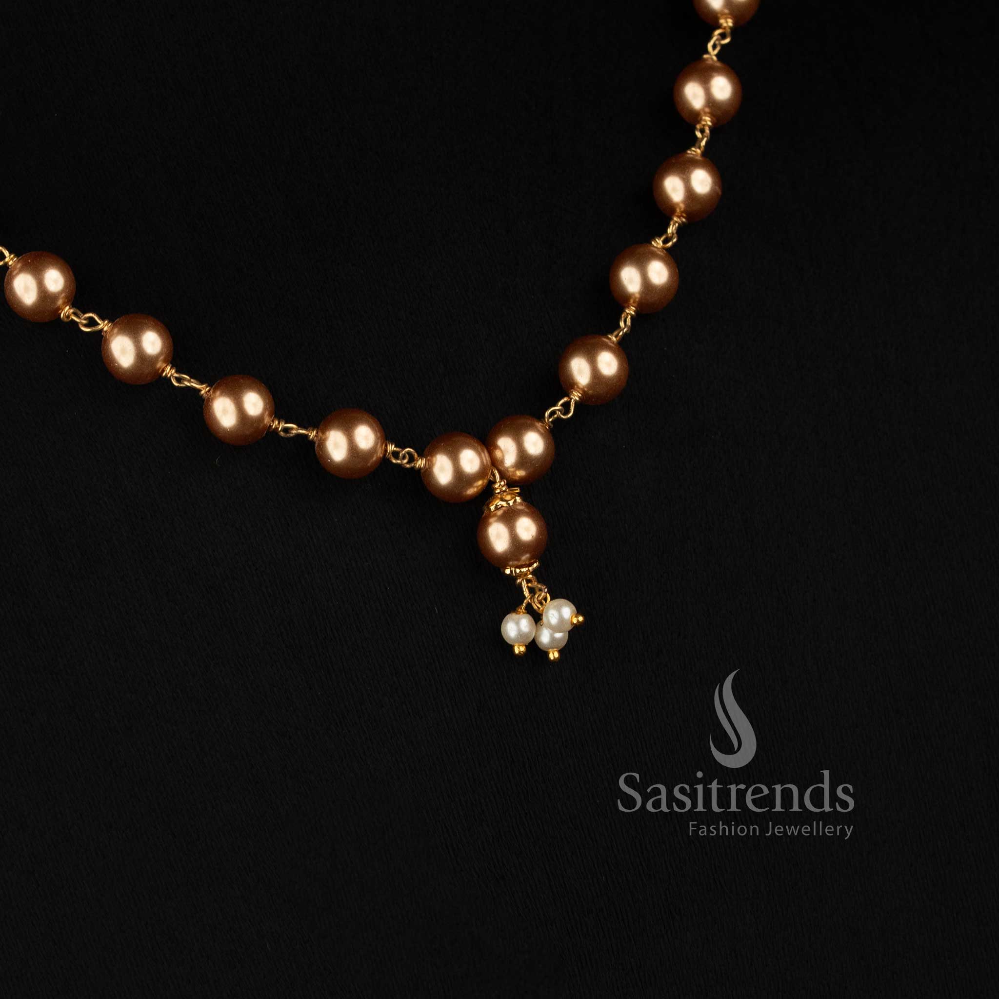 Sasitrends one gram 24K Micro Gold Plated golden pearl necklace featuring single strand bead arrangement and centre pendant 