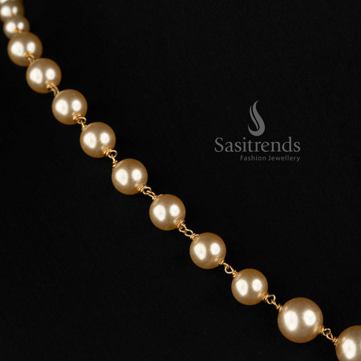 Sasitrends Micro Gold Plated graduated round pearl necklace with larger centre pearls 