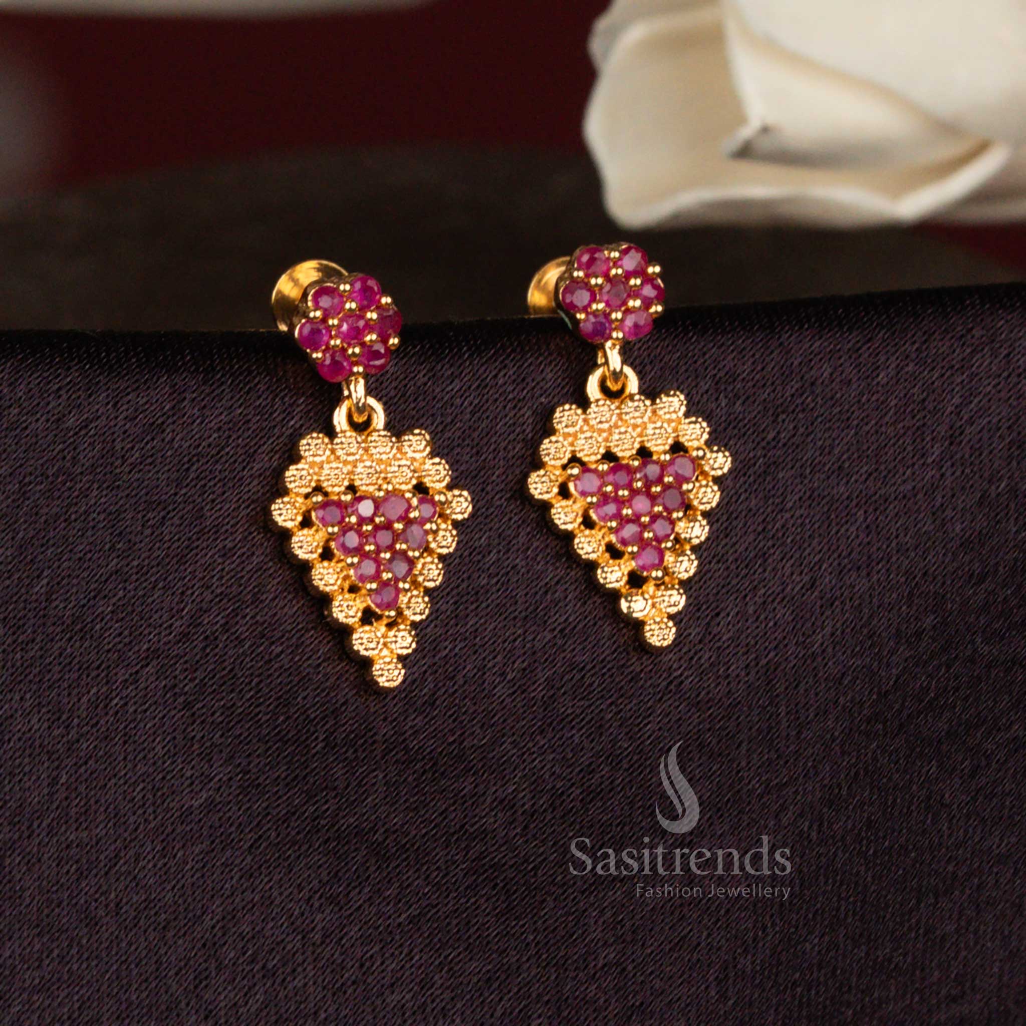 Sasitrends micro gold plated ruby American diamond floral drop earrings with textured cluster leaf structure and real gold appearance