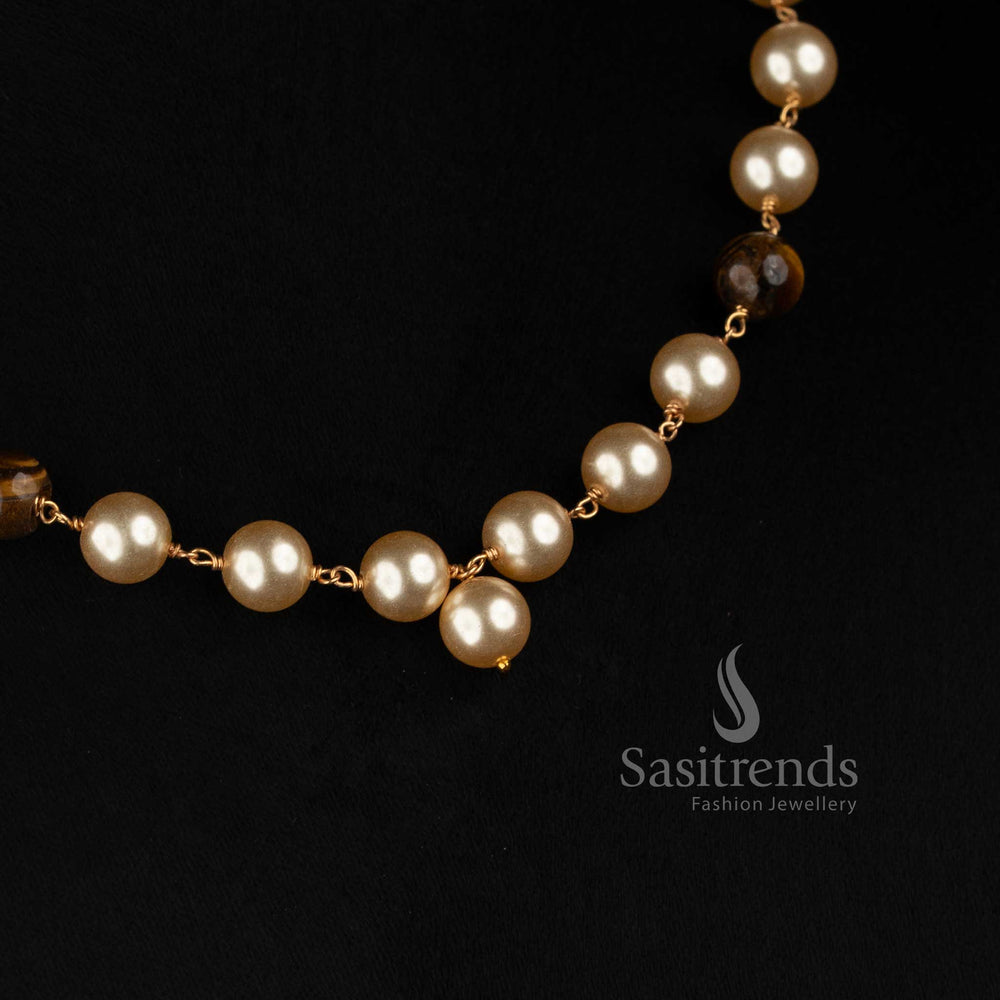 Sasitrends Micro Gold Plated necklace featuring tiger stone accents and centre pearl drop 