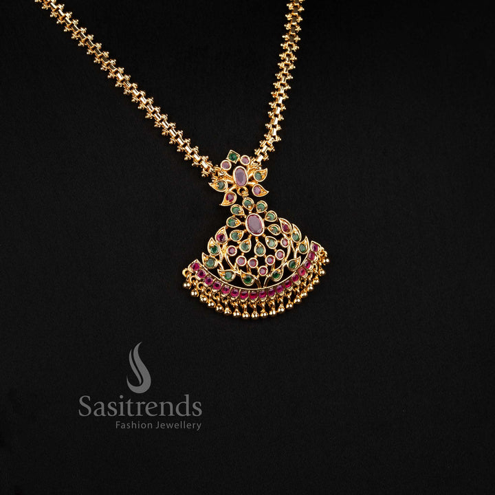 Sasitrends micro gold plated festive necklace showcasing a structured dome pendant with stone embellishment, curved border and hanging gold accents 