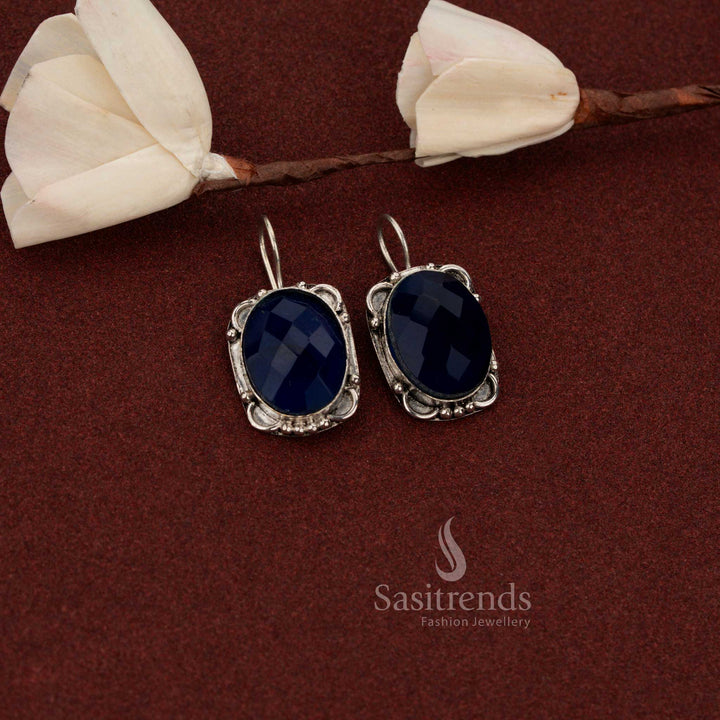Sasitrends minimal vintage oxidised German silver drop earrings accented with oval faceted blue stone and subtle floral detailing