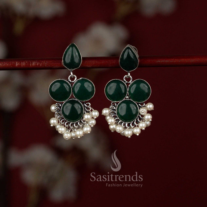Modern green oxidised silver earrings by Sasitrends crafted with a luminous round Monalisa stone paired with a teardrop element and refined pearl detailing, suitable for office wear and kurti styling.