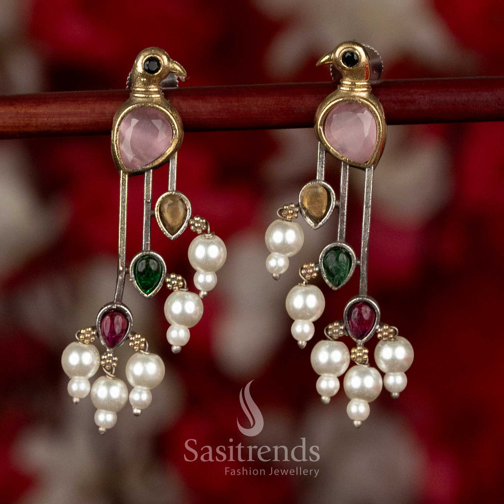 
Sasitrends pink mult icolor oxidised silver parrot earrings crafted with layered stone arrangement and pearl accents for festive and ethnic wear
