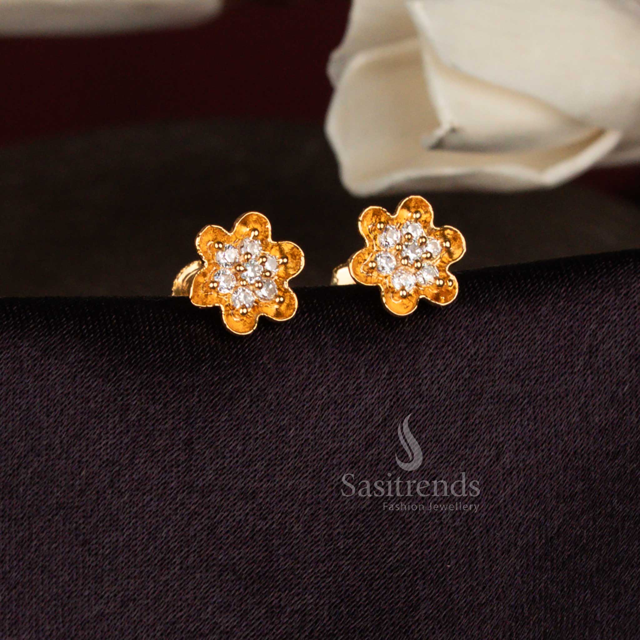 Sasitrends floral design white AD stone stud earrings featuring layered petal construction and classic micro gold finish