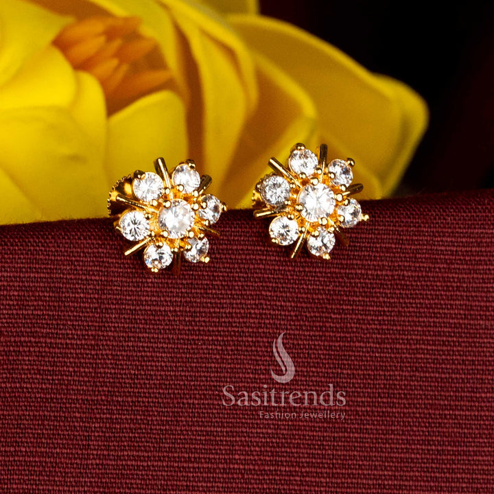 Traditional floral stud earrings featuring micro gold plated white AD stones and pearl petal arrangement - Sasitrends