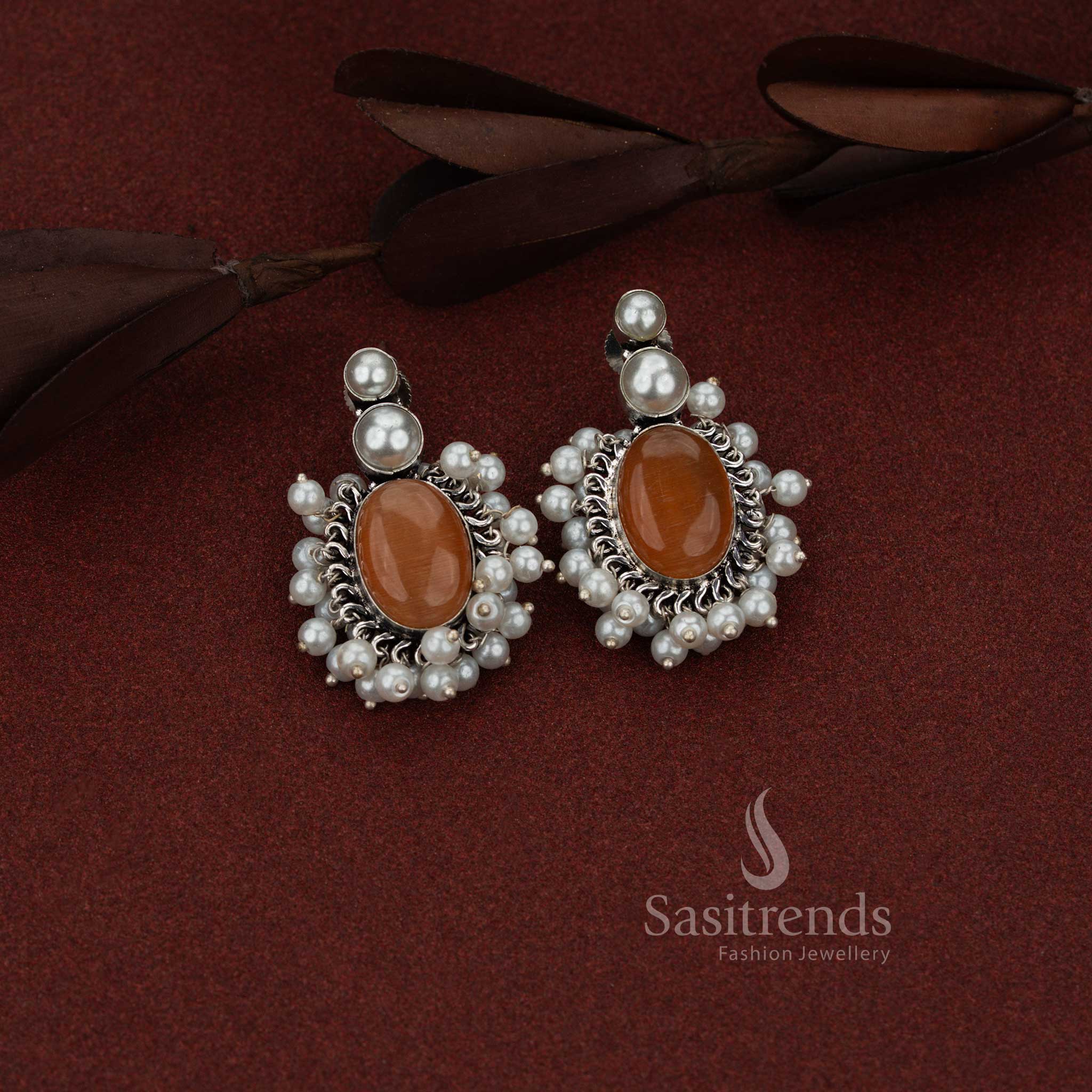 Sasitrends oxidised silver orange stud earrings showcasing an oval cluster layout with refined double pearl top detailing