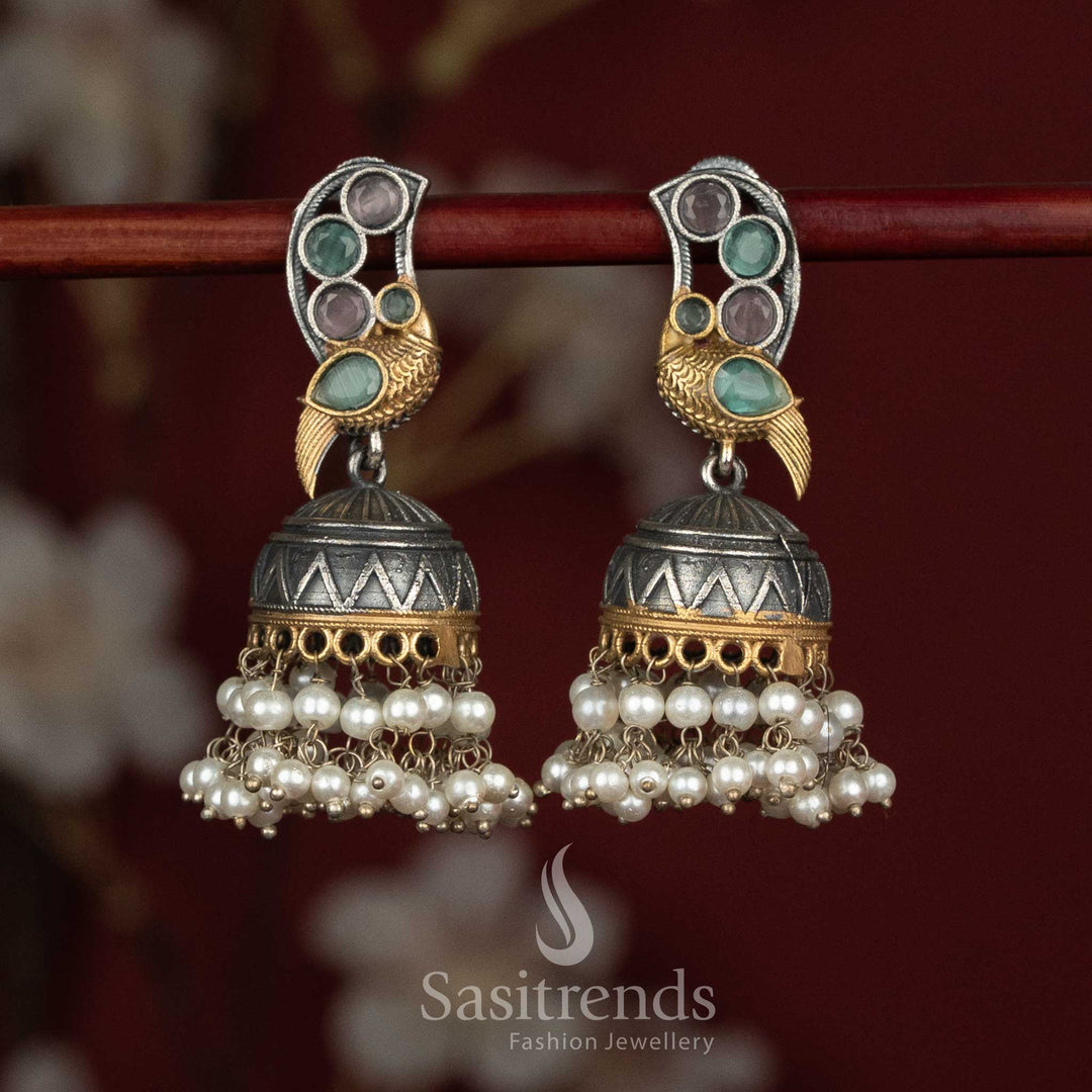 Sasitrends oxidised peacock motif jhumka earrings with Monalisa stone detailing and layered pearl hangings for party wear