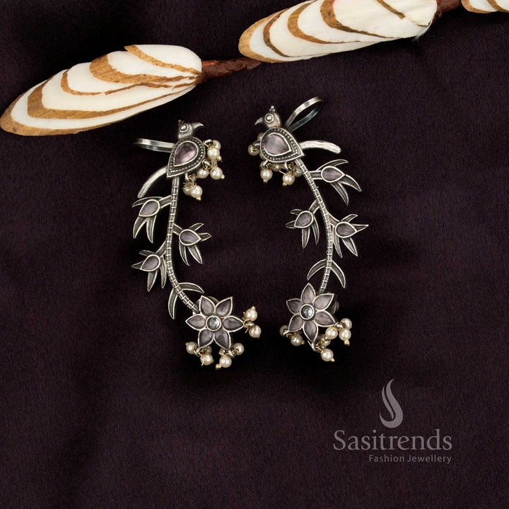 Sasitrends oxidised peacock vine ear cuff earrings adorned with pink stones and detailed antique finish