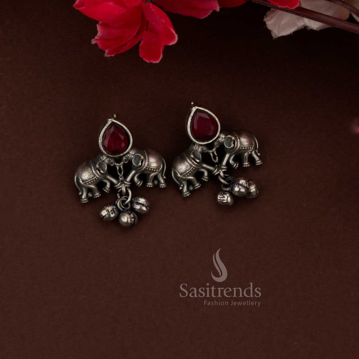 Sasitrends oxidised silver husli necklace set red earrings adorned with detailed elephant design suitable for ethnic occasions and celebrations