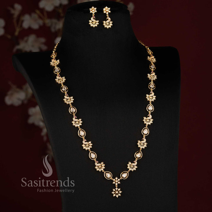 Sasitrends Impon Addigai 24K pure gold plated necklace set featuring an intricate floral framework, AD stone accents and decorative centre drop 