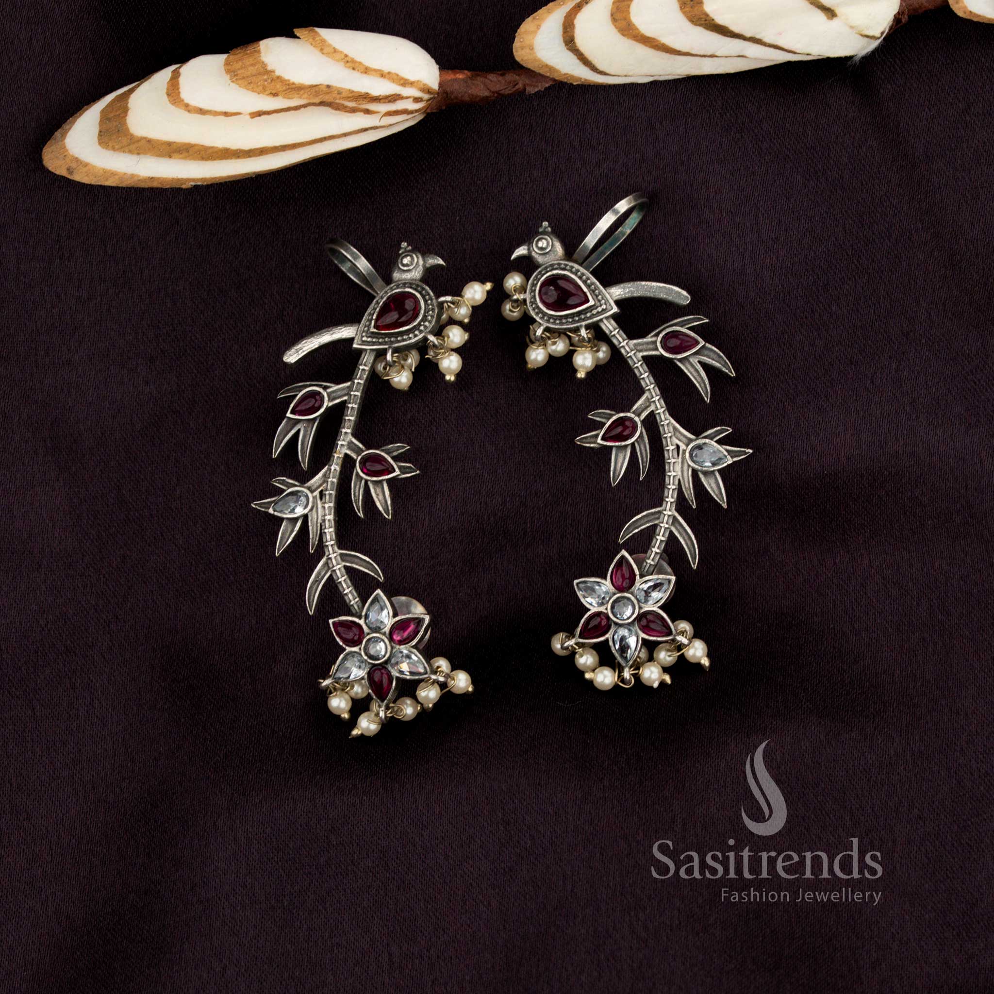 Sasitrends peacock vine inspired oxidised white ruby ear cuff earrings reflecting antique elegance and charm