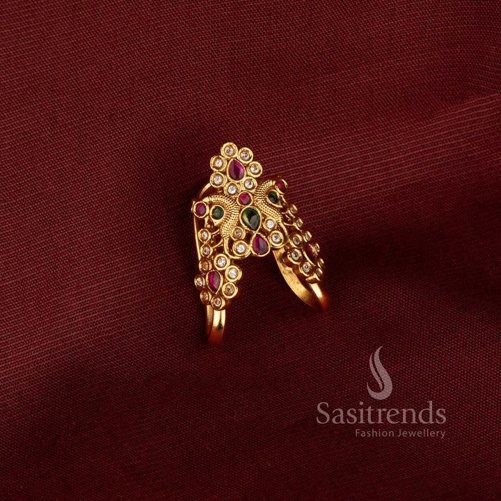 Elegant women’s matte gold plated AD stone ring from Sasitrends with a layered decorative structure, clustered brilliant stones and detailed curved gold elements, suitable for sarees, ethnic outfits, weddings and celebrations