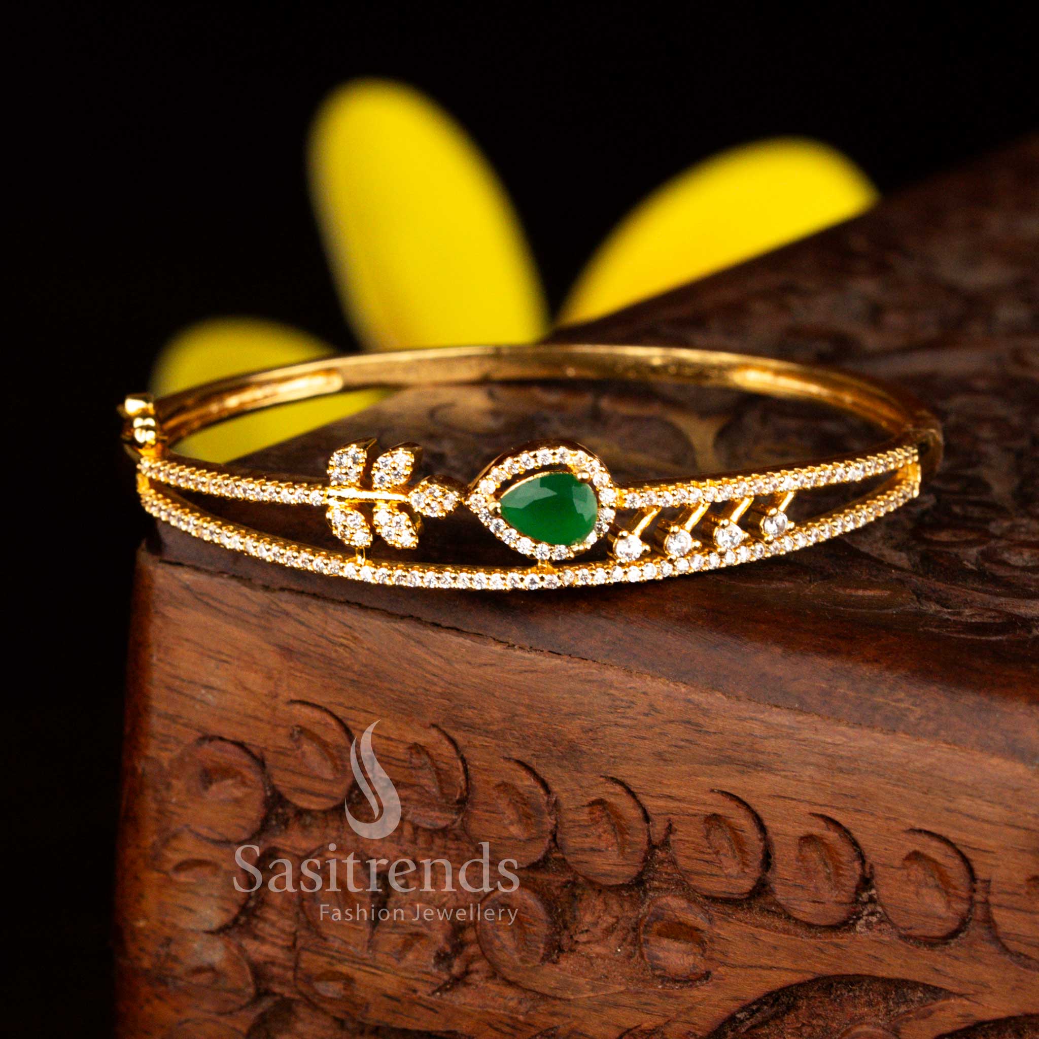 Sasitrends premium micro gold plated floral teardrop white green American diamond openable kada bangle featuring sparkling stones and guaranteed rich gold shine perfect for weddings.
