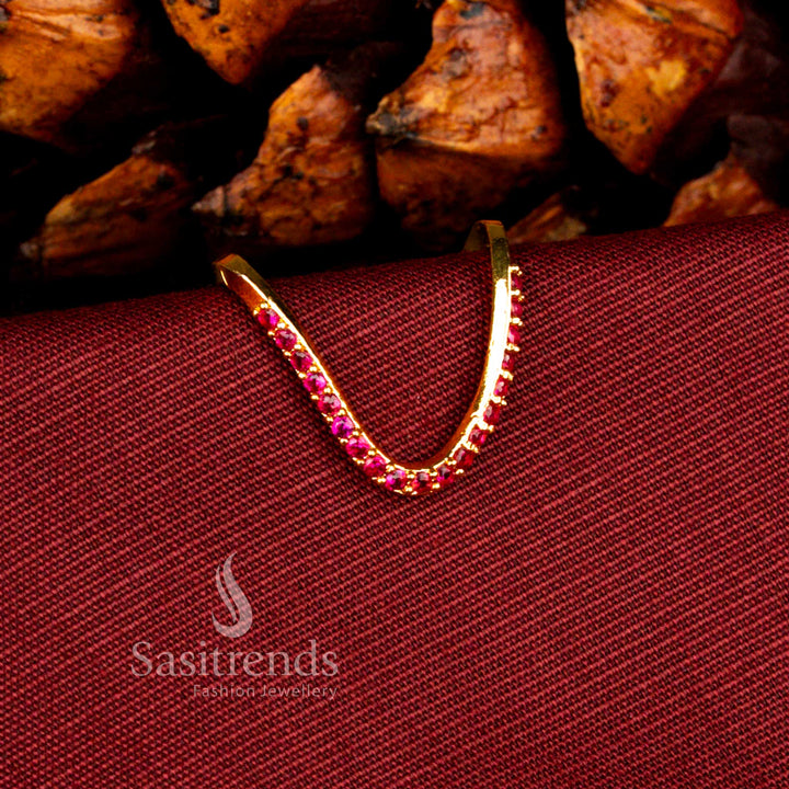 Sasitrends premium 24K micro gold plated ruby AD statement ring crafted in a bold U-shaped curved arc structure with precisely set stones and rich gold lustre for grand occasions.