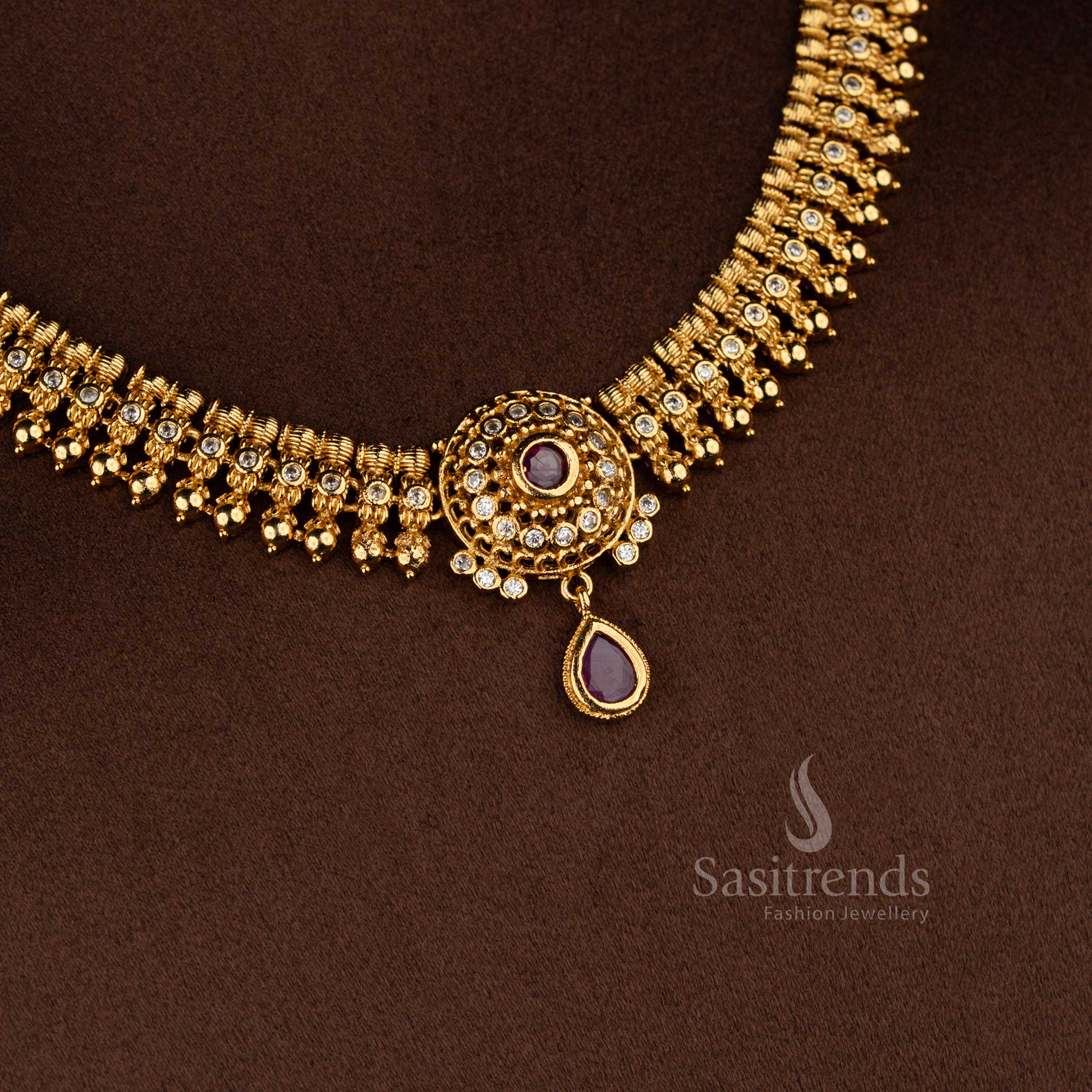 Sasitrends temple matte gold plated white ruby AD stone floral circle necklace set with rich stone work for bridal wear