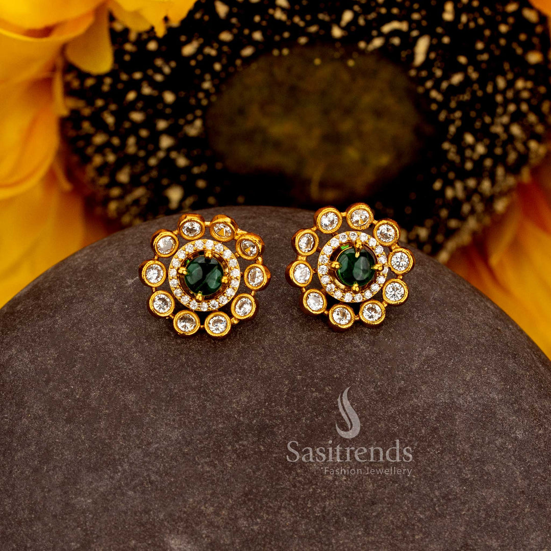 Sasitrends premium temple matte gold plated AD stone stud earrings featuring a round centre stone with concentric circular stone detailing and floral-inspired outer petal arrangement 