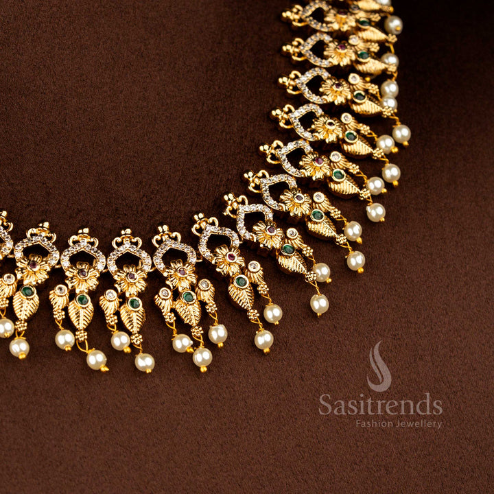 Sasitrends premium temple matte gold plated floral motif multi AD stone short necklace jewellery set crafted with intricate temple detailing for weddings, bridal wear, festive celebrations, religious ceremonies and cultural occasions