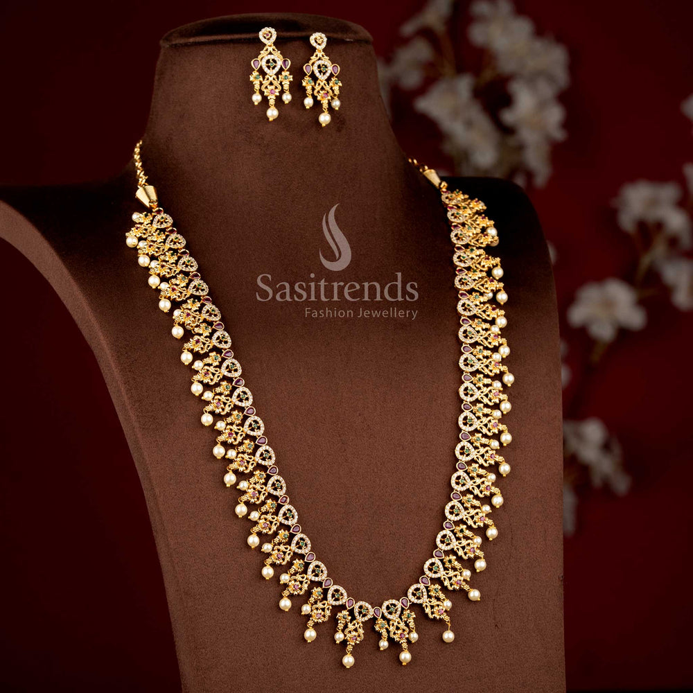 Sasitrends premium temple matte gold plated peacock teardrop floral motif pearl drop multi AD stone long necklace jewellery set crafted with intricate temple artistry for weddings, engagement ceremonies, festive celebrations, poojas and cultural gatherings