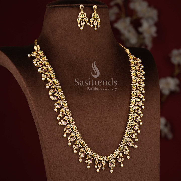 Sasitrends premium temple matte gold plated teardrop motif floral multi AD stone long necklace jewellery set designed for weddings, receptions, festive celebrations, cultural events and traditional family functions