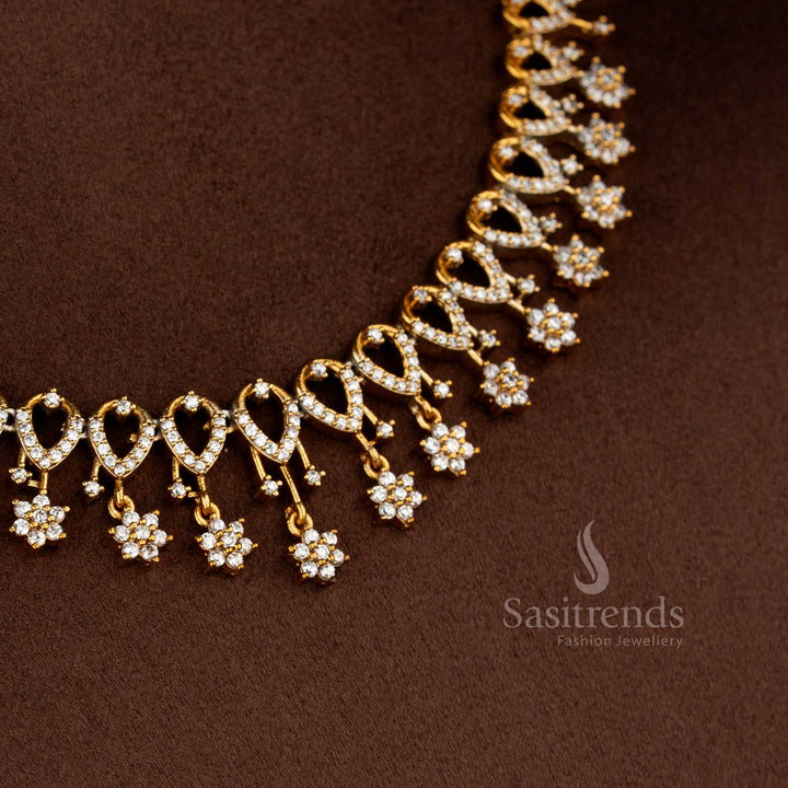 Sasitrends premium white AD studded floral design matte gold plated necklace set crafted for traditional functions and festive occasions