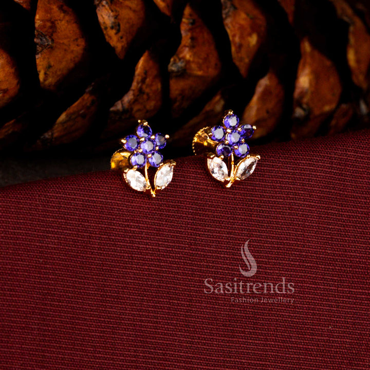 Sasitrends premium one gram micro gold plated earrings crafted in a floral starburst silhouette with sparkling purple AD stones and elegant marquise leaf accents for bridal and celebration wear.