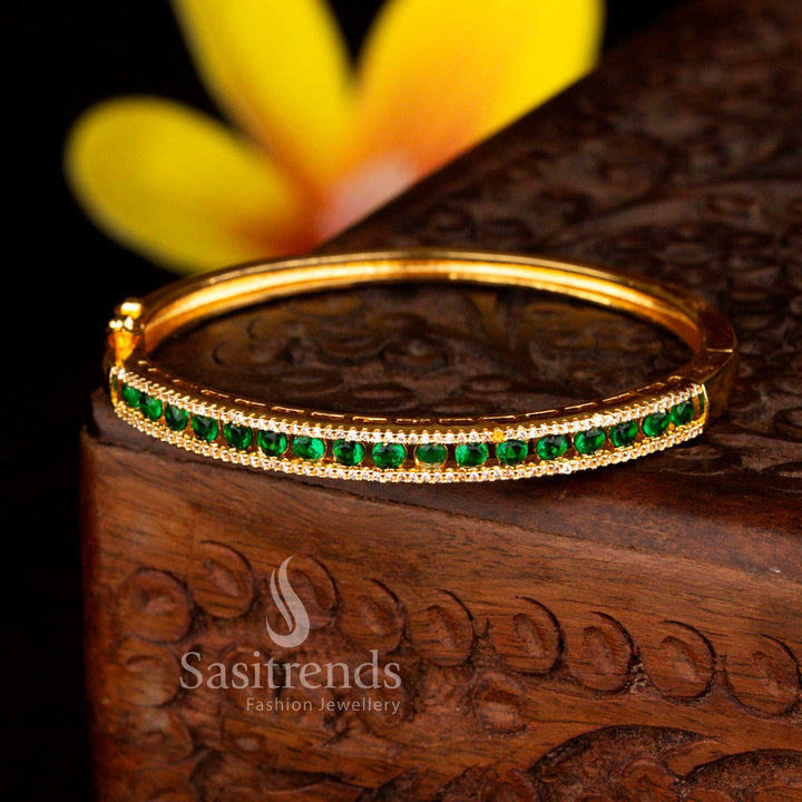 Sasitrends radiant micro gold plated two rows of petite white green American diamond openable kada bangle showcasing dazzling stones and elegant gold lustre.