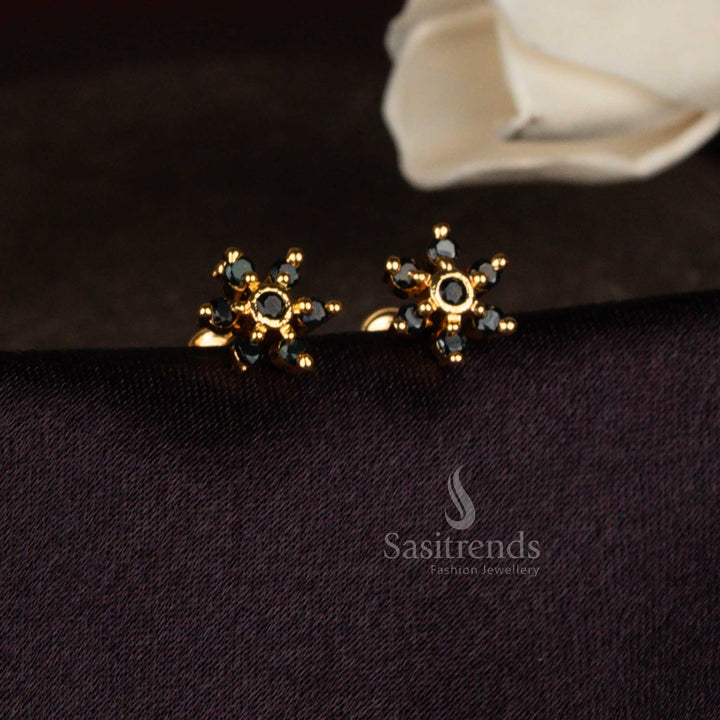 Sasitrends micro gold plated black American diamond stud earrings designed in a radiant star floral structure with raised centre detailing
