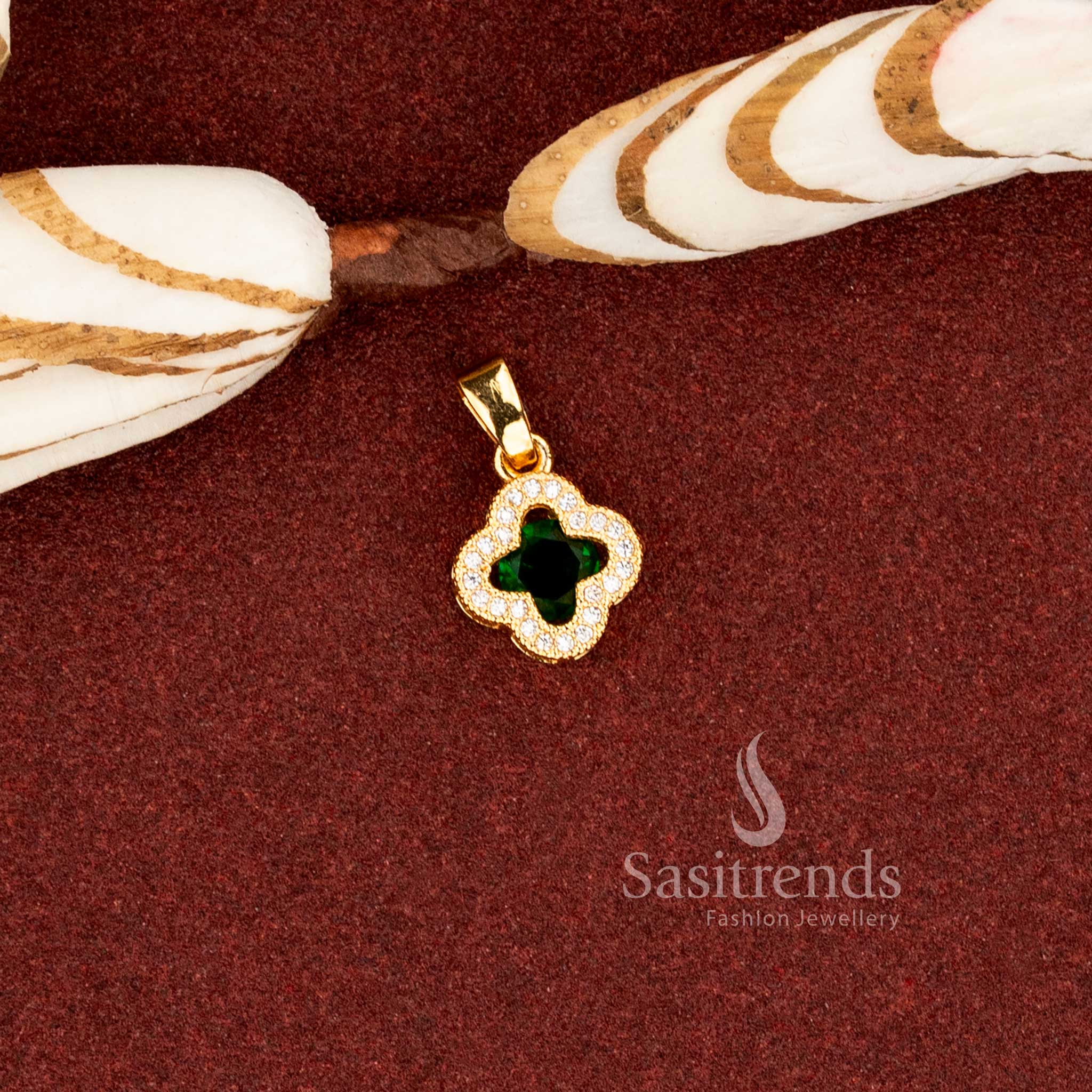 Sasitrends real gold look 24K micro gold plated green AD stone floral clover pendant designed with a layered stone frame structure and intricate craftsmanship in premium 1 gram jewellery finish