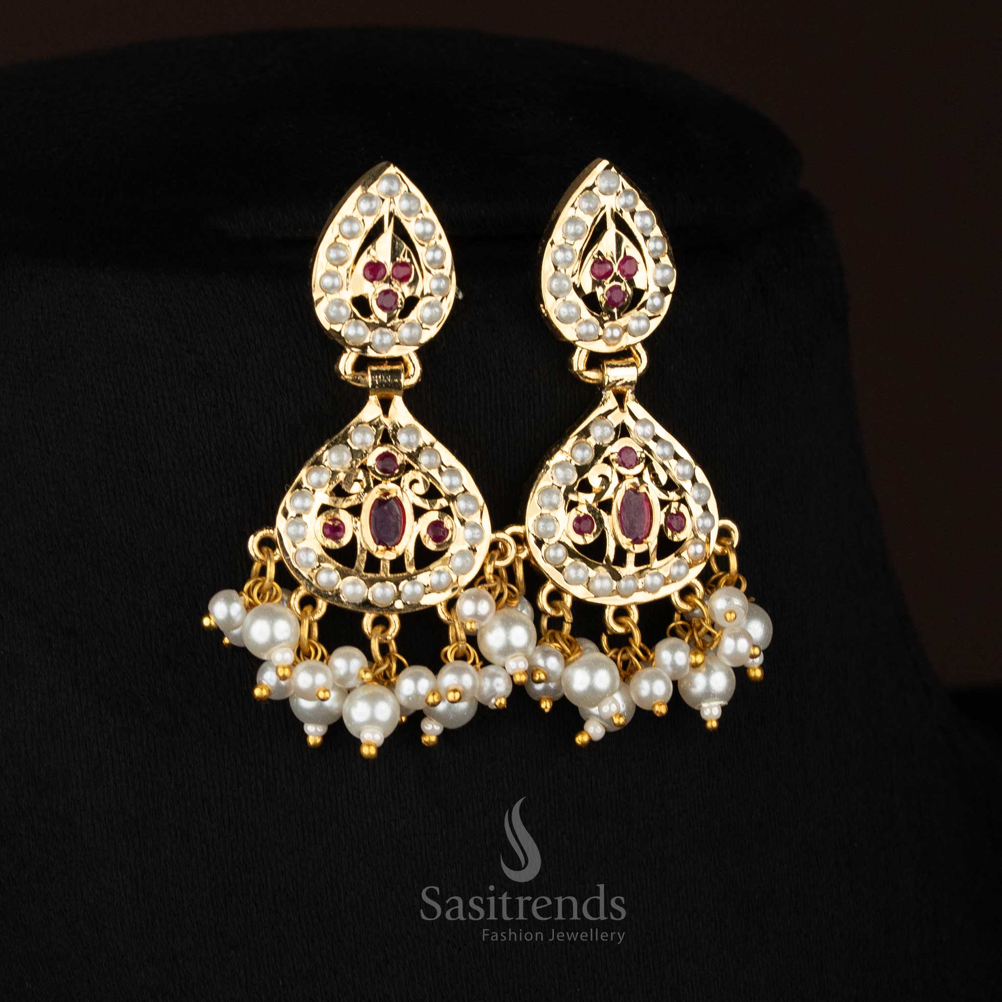 traditional four layer pearl haram jewellery featuring American Diamond stone centre design, pearl drop detailing and premium micro gold plated finish for engagement and party wear from Sasitrends