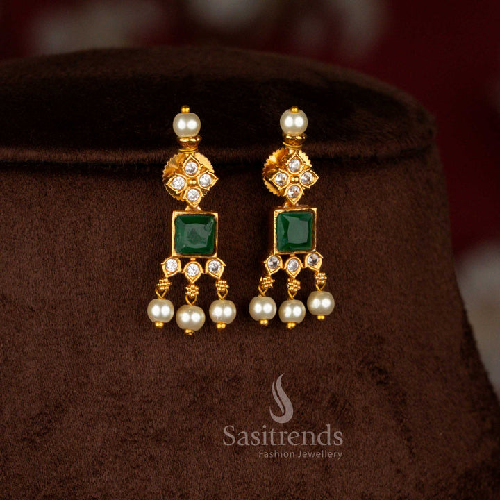 Sasitrends rich quality temple style bridal choker necklace set in matte gold finish featuring bold square motifs, radiant AD stones and pearl embellishments for traditional ceremonies.