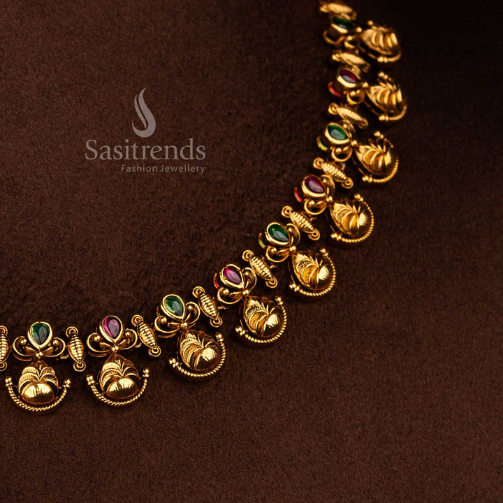 Sasitrends festive and wedding temple necklace set designed with elegant floral leaf patterns, ruby green AD stone highlights, and a rich traditional appearance