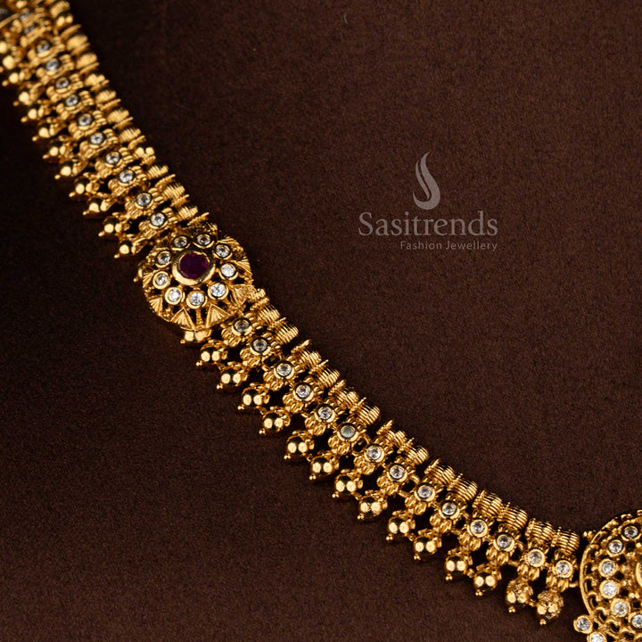Sasitrends matte gold plated white ruby AD stone temple necklace and earrings with traditional floral design