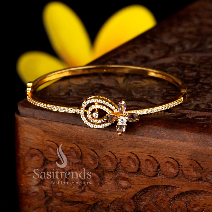 Sasitrends royal micro gold plated swirl motif floral accent white purple American diamond openable kada bangle crafted for bridal and festive wear with radiant gold shine.