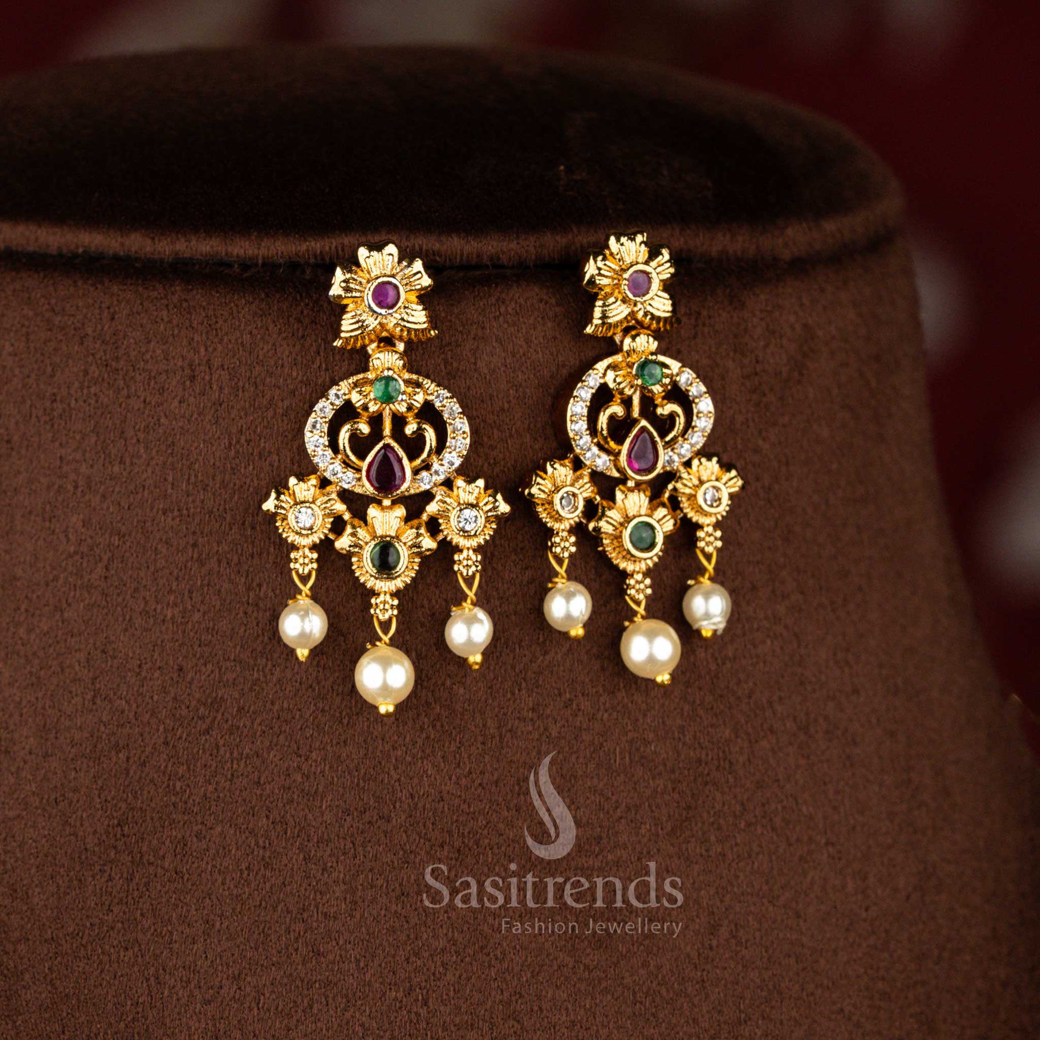 Sasitrends royal temple matte gold plated peacock teardrop floral motif pearl drop multi American diamond short necklace jewellery set designed for weddings, receptions, devotional events and traditional celebrations