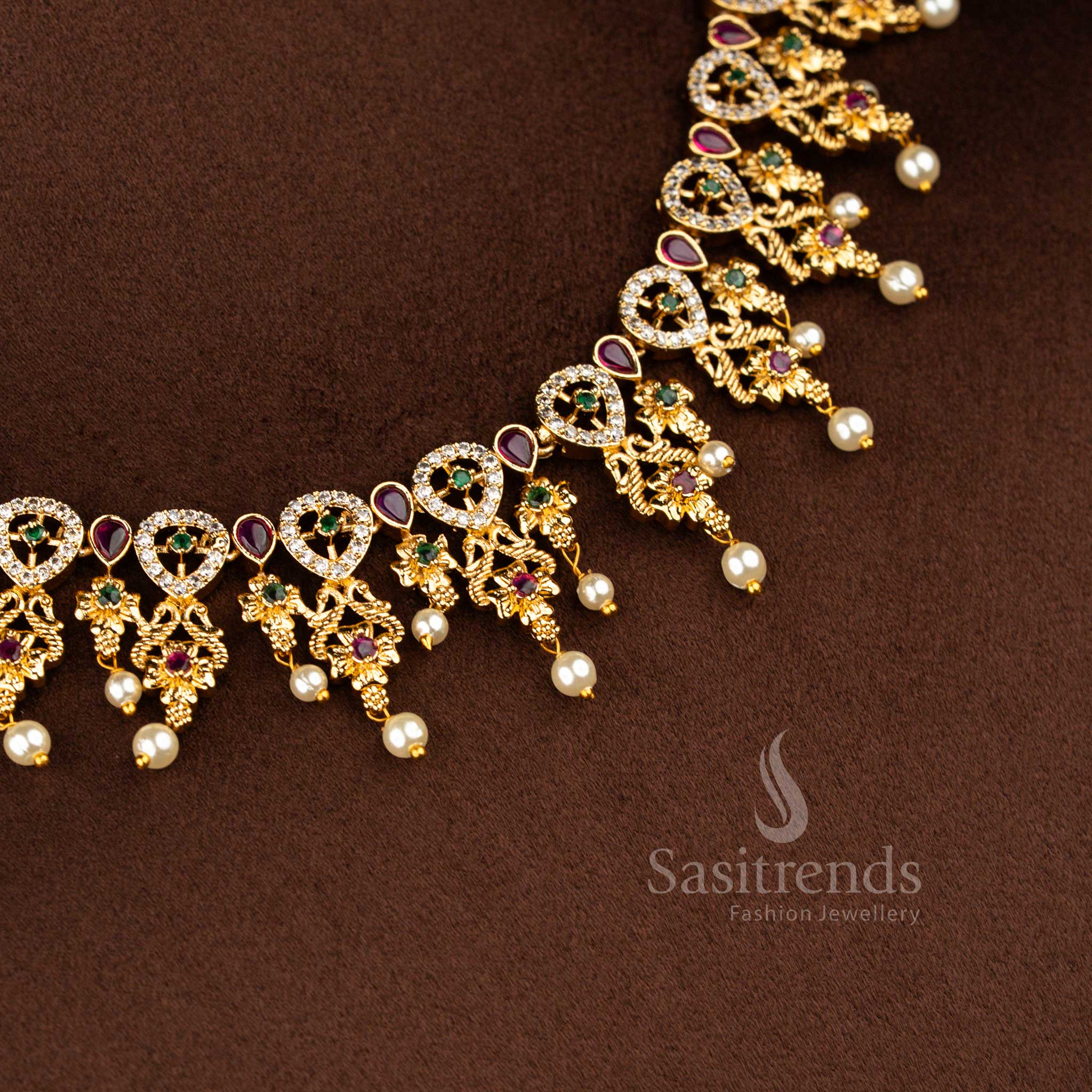 Sasitrends royal temple matte gold plated peacock teardrop floral motif pearl drop multi American diamond short necklace jewellery set designed for weddings, receptions, devotional events and traditional occasions