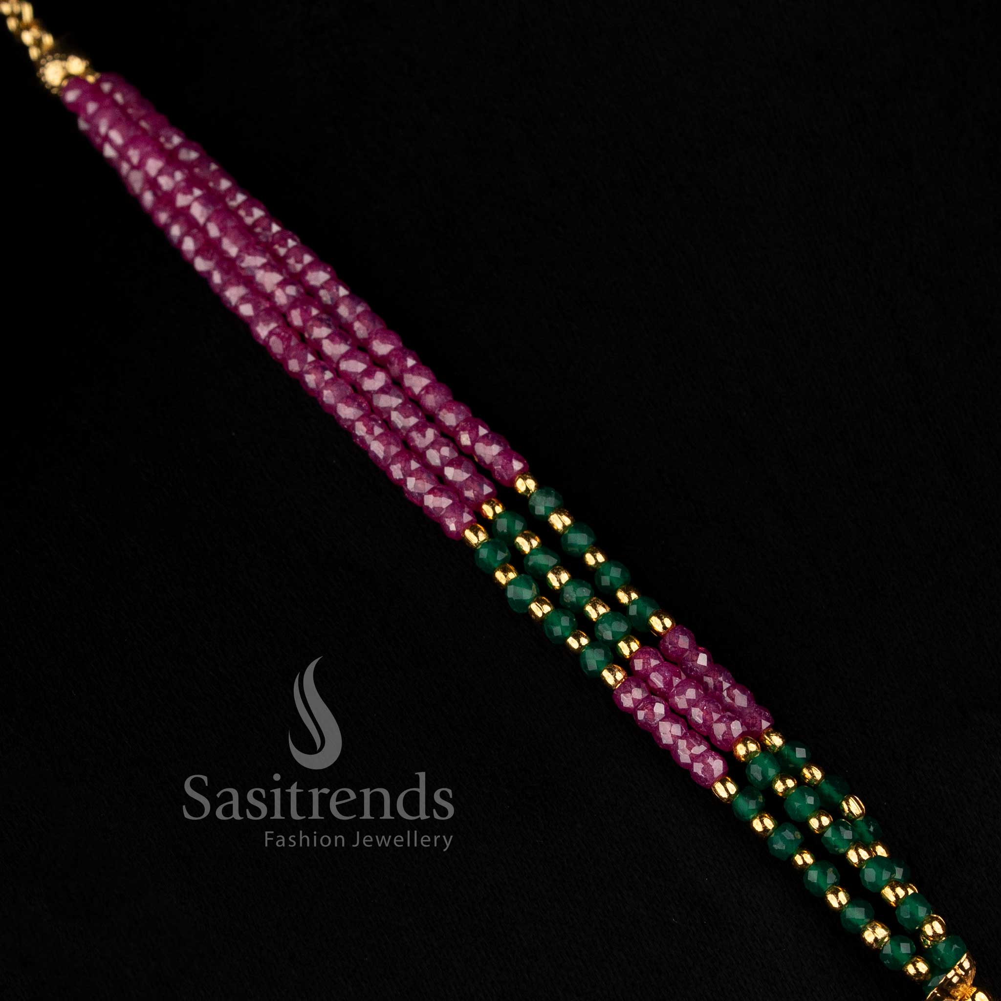 Traditional Goddess Lakshmi statement necklace showcasing layered bead strands, ornate rounded bead detailing and seven embossed Lakshmi coin-style pendants for wedding and ethnic outfits