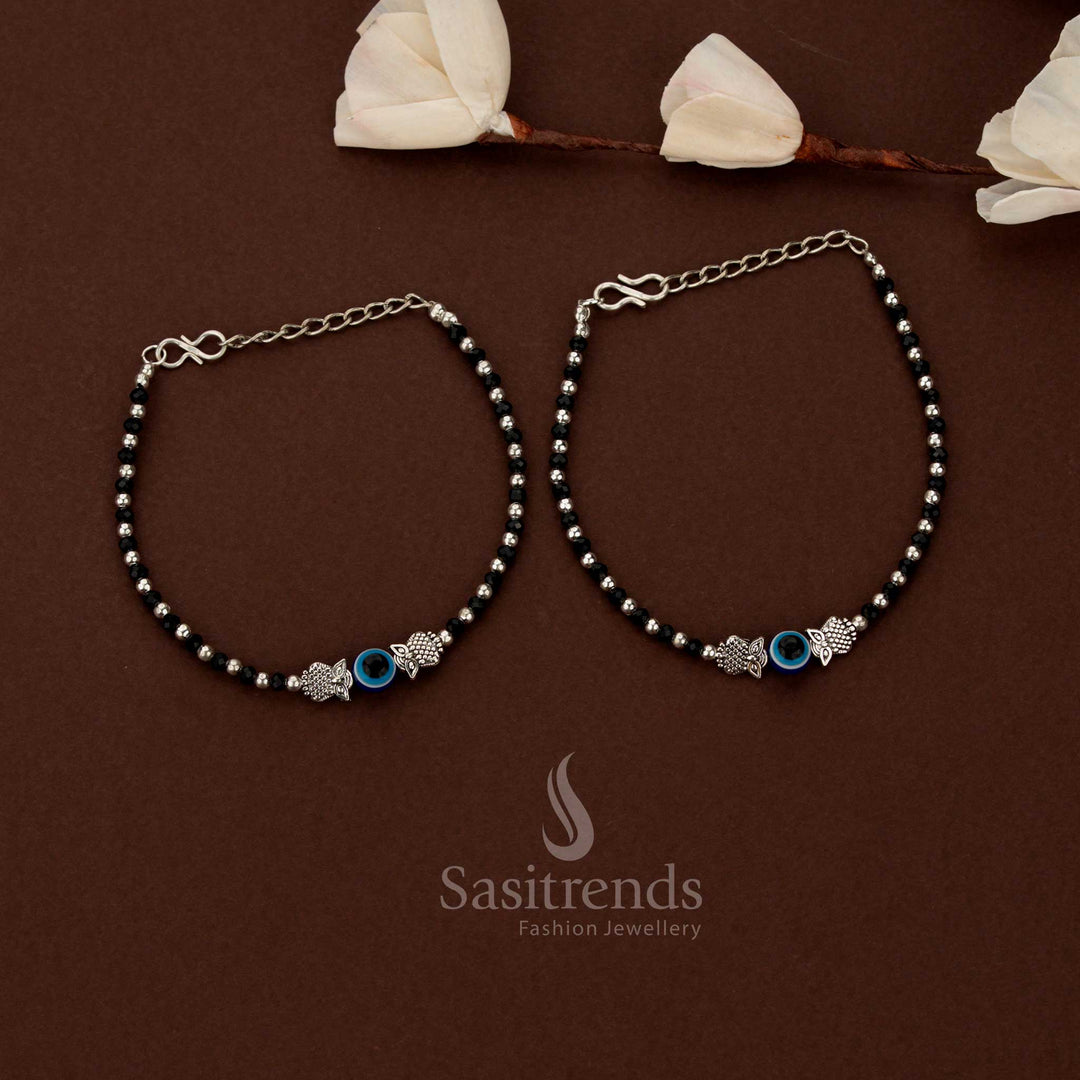 Sasitrends oxidised beaded owl motif anklet with blue eye center charm