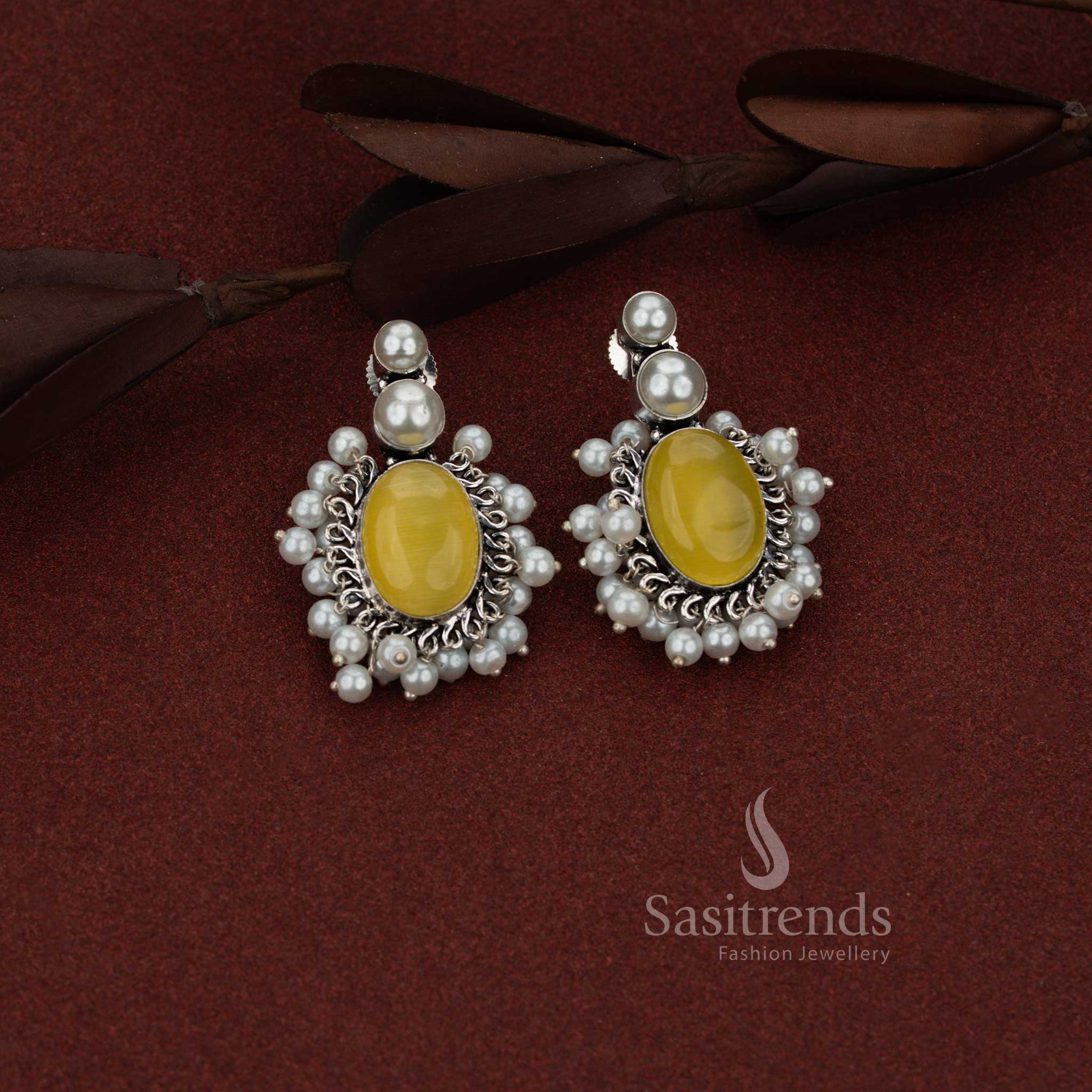 Sasitrends stylish oxidised silver yellow stud earrings crafted with double pearl top and structured oval cluster design