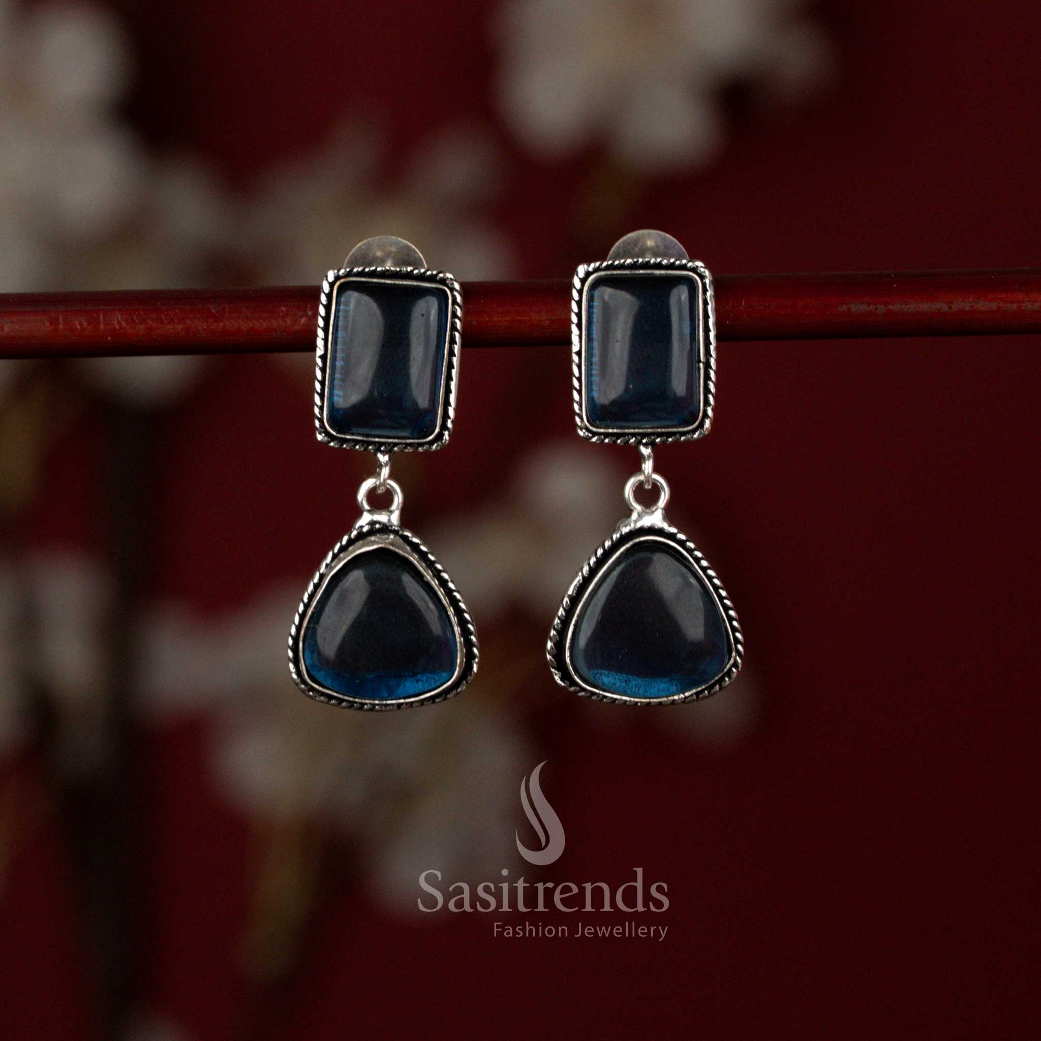 Stylish blue oxidised geometric dangler earrings by Sasitrends showcasing a square upper design paired with a triangular lower frame, highlighted with Monalisa stones and pearl accents for day outings and casual gatherings.