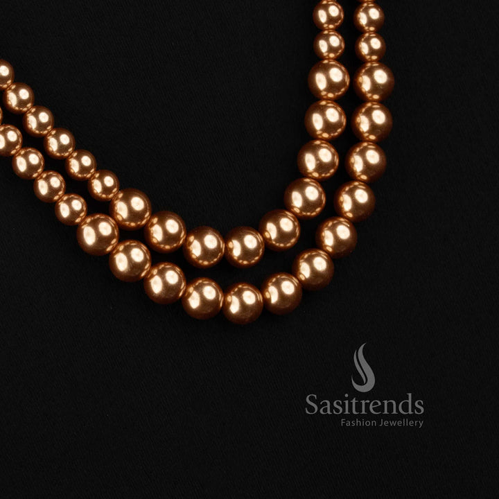 Sasitrends Swarovski replica necklace featuring graduated round golden pearls 