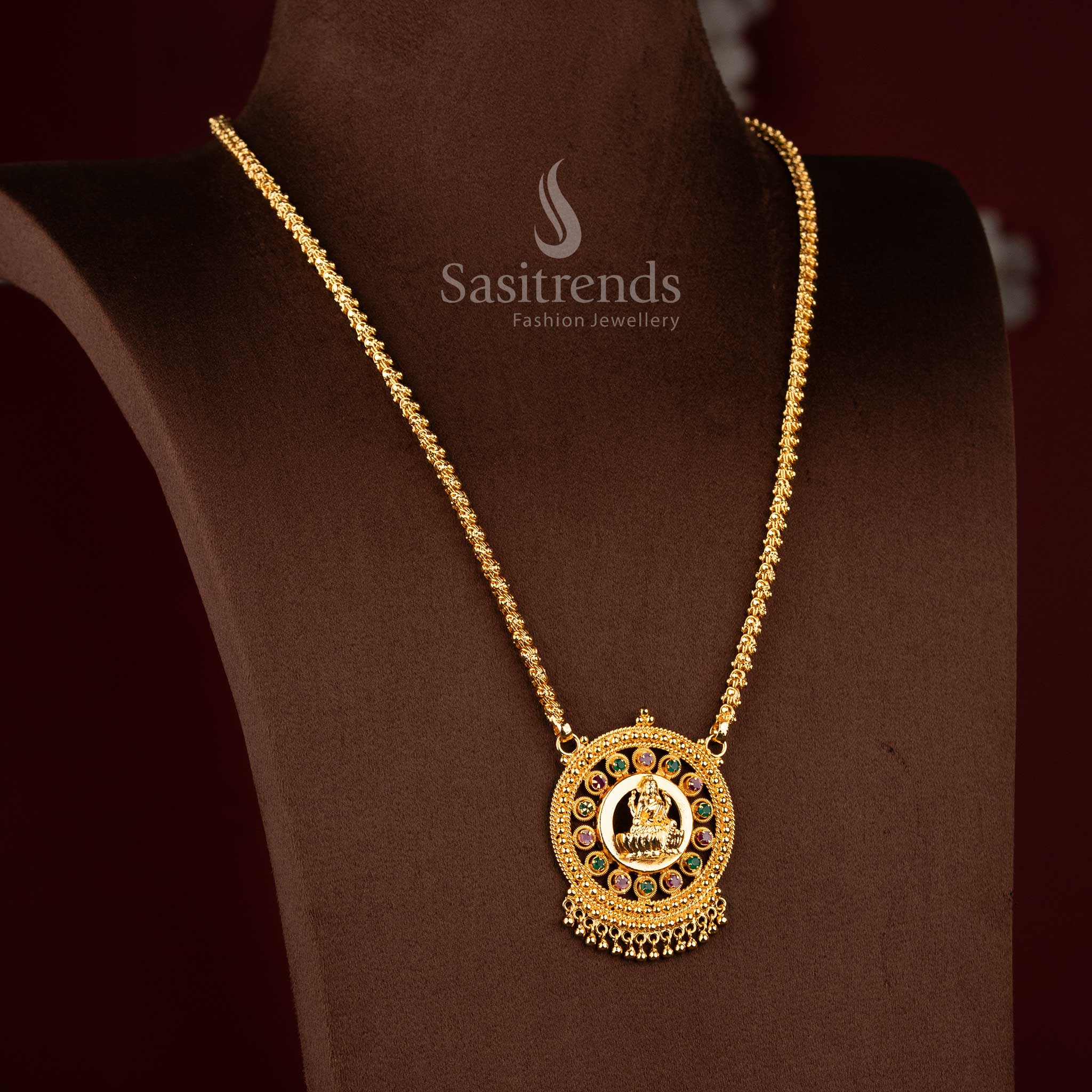Sasitrends temple inspired one gram micro gold plated Lakshmi motif pendant chain necklace with AD stone encircled frame designed for elegant traditional attire