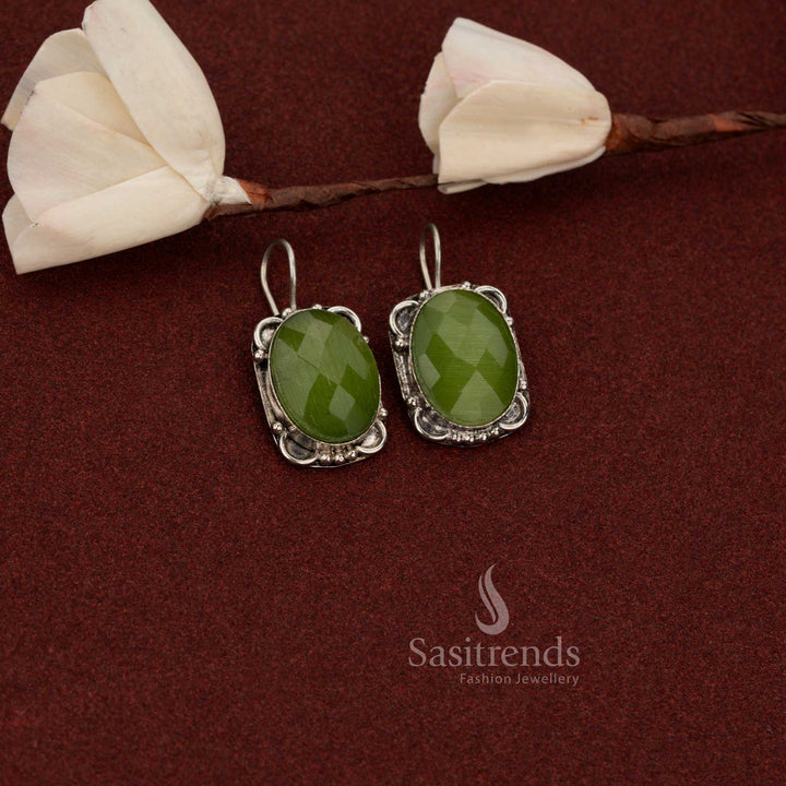 Sasitrends timeless oxidised German silver drop earrings featuring oval light green stone and classic floral frame design