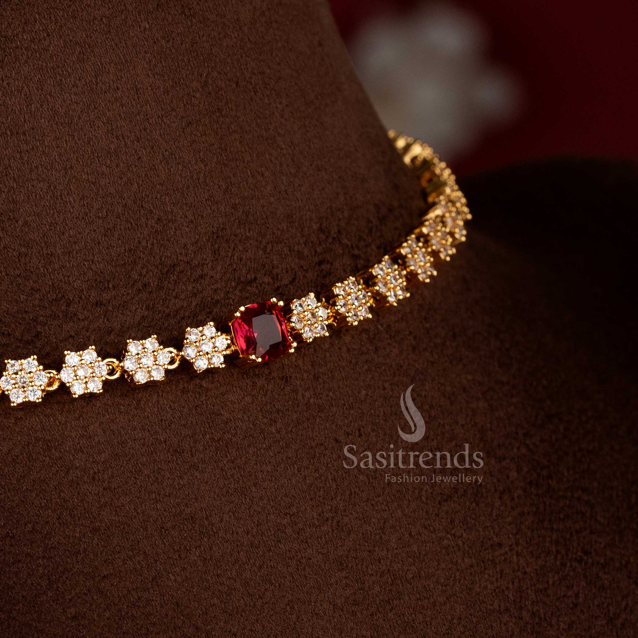 Sasitrends American Diamond micro gold plated floral necklace jewellery set featuring square-cut red stone centre and symmetrical link structure